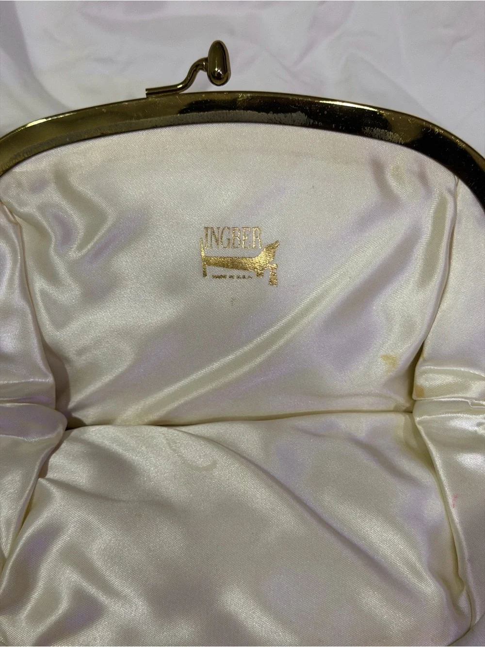 Elegant White Leather Kiss-Lock Clutch with Floral-Trim Frame